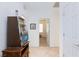 Hallway featuring neutral-colored tile flooring and white doors at 4012 Shetland Pony St, Las Vegas, NV 89122