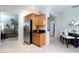 Bright kitchen leading to a dining area with a stainless steel refrigerator at 4012 Shetland Pony St, Las Vegas, NV 89122