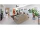 Bright living room showcasing neutral-colored walls and tile flooring throughout at 4012 Shetland Pony St, Las Vegas, NV 89122