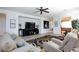 Bright living room features neutral-colored walls and tile flooring at 4012 Shetland Pony St, Las Vegas, NV 89122