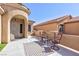 Outdoor patio with seating area and decorative rug, perfect for relaxation and entertaining at 4012 Shetland Pony St, Las Vegas, NV 89122