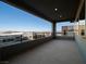 Spacious balcony with sleek railing offers panoramic views of the city skyline at 4880 Argento Peak St, Las Vegas, NV 89135