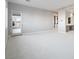 Bright bedroom featuring neutral walls, carpet, and balcony access with great light at 4880 Argento Peak St, Las Vegas, NV 89135