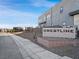 Community sign for Crestline showcases modern design and well-maintained landscaping at 4880 Argento Peak St, Las Vegas, NV 89135