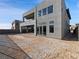 Modern home showcasing clean lines, expansive windows, and a large backyard area at 4880 Argento Peak St, Las Vegas, NV 89135