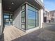 Outdoor patio area featuring sleek design, modern windows, and a well-paved surface at 4880 Argento Peak St, Las Vegas, NV 89135