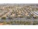 Aerial view of a vast community with mature trees and a mix of residential buildings at 5002 S Rainbow Blvd # 101, Las Vegas, NV 89118