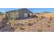 Spacious backyard featuring desert landscaping with a rock ground cover, providing a low-maintenance outdoor space at 518 Copper Falcon Ave, Henderson, NV 89011