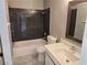 Updated bathroom featuring a shower and bathtub combination and modern vanity at 6743 W Charleston Blvd # 4, Las Vegas, NV 89146
