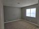 Neutral bedroom with plush carpeting and a large window for natural light at 6743 W Charleston Blvd # 4, Las Vegas, NV 89146