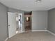 Spacious bedroom leading to bathroom and walkway at 6743 W Charleston Blvd # 4, Las Vegas, NV 89146
