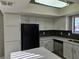 Well-lit kitchen features stainless steel appliances and stylish backsplash at 6743 W Charleston Blvd # 4, Las Vegas, NV 89146