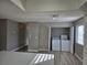 Bright laundry area with in-unit washer and dryer, and white cabinets at 6743 W Charleston Blvd # 4, Las Vegas, NV 89146