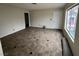 Open-concept living room with tile flooring, natural light, and easy access to other areas at 7046 Royal Meadow Pl, Las Vegas, NV 89147