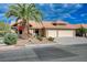 Charming home with a well-manicured yard and mature trees providing shade, showcasing great curb appeal at 7724 Clearwood Ave, Las Vegas, NV 89123