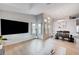 Stylish living room with large windows, modern decor, and an open layout, perfect for relaxation and entertaining at 7724 Clearwood Ave, Las Vegas, NV 89123