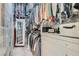 Organized walk-in closet with ample storage, custom shelving, and clothing racks at 795 Sunny Sagebrush St, Henderson, NV 89011