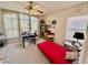 Bedroom with lots of natural light, a ceiling fan, and carpet at 8461 Faucet Ave, Las Vegas, NV 89147