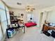 Bedroom with lots of natural light, a ceiling fan, and carpet at 8461 Faucet Ave, Las Vegas, NV 89147