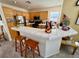 Eat-in kitchen with tile countertops and stainless steel appliances at 8461 Faucet Ave, Las Vegas, NV 89147