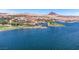 Expansive aerial view of the resort community, showcasing the lake and surrounding landscape at 9 Promenade Isle Ln, Henderson, NV 89011
