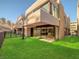 Modern townhomes with green lawns and stylish exteriors at 9 Promenade Isle Ln, Henderson, NV 89011