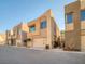 Modern townhomes with garages and sleek designs at 9 Promenade Isle Ln, Henderson, NV 89011