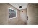 Modern bathroom features a glass shower with view to exterior rock wall at 9 Promenade Isle Ln, Henderson, NV 89011