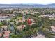 Beautiful home surrounded by mature trees in a golf course community with a lake and mountain views at 9044 Opus Dr, Las Vegas, NV 89117