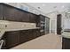 Spacious kitchen offers stainless steel appliances, extensive cabinetry, and tiled flooring at 9044 Opus Dr, Las Vegas, NV 89117
