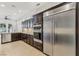 Well-equipped kitchen featuring stainless steel appliances, custom cabinetry, and ample counter space at 9044 Opus Dr, Las Vegas, NV 89117