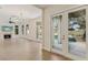 Open living space featuring a fireplace with easy access to outdoor pool and spa at 9044 Opus Dr, Las Vegas, NV 89117