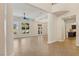 Bright living room with tile floors, large windows, and elegant architectural details at 9044 Opus Dr, Las Vegas, NV 89117