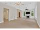 Bright living room with tile floors, fireplace, and open layout at 9044 Opus Dr, Las Vegas, NV 89117