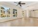 Bright and airy living space with tile flooring and a view of the pool at 9044 Opus Dr, Las Vegas, NV 89117