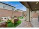 Charming patio with outdoor furniture and play area at 9835 Fox Estate St, Las Vegas, NV 89141