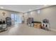 Finished basement features durable laminate floors, recessed lighting and a sliding glass door to access the backyard at 9835 Fox Estate St, Las Vegas, NV 89141