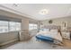 Inviting primary bedroom featuring carpet flooring, neutral walls, and plenty of natural light at 9835 Fox Estate St, Las Vegas, NV 89141