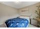 Well-lit bedroom with carpet flooring, neutral walls, and a window for natural light at 9835 Fox Estate St, Las Vegas, NV 89141