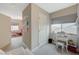 Bright bedroom with a small vanity table, bunkbeds and plenty of natural light at 9835 Fox Estate St, Las Vegas, NV 89141