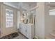 Bright foyer with a decorative cabinet and a view of the front door at 9835 Fox Estate St, Las Vegas, NV 89141