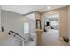 Upstairs hallway with neutral tones, connecting to various rooms in the home at 9835 Fox Estate St, Las Vegas, NV 89141