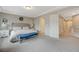 Comfortable primary bedroom featuring carpet floors, neutral walls, and access to the hallway at 9835 Fox Estate St, Las Vegas, NV 89141