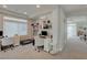 Bright office featuring dual desks, stylish decor, and seamless integration into the home's open floor plan at 9835 Fox Estate St, Las Vegas, NV 89141