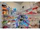 Walk-in pantry with wire shelving, offering ample storage space for groceries and kitchen essentials at 9835 Fox Estate St, Las Vegas, NV 89141