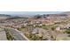 Aerial view of home and neighborhood showcasing mountain and city views at 13 Scenic Terrain Ave, Henderson, NV 89011