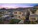 This beautiful backyard features a putting green, area, and desert landscaping at 13 Scenic Terrain Ave, Henderson, NV 89011