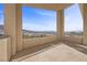 A spacious balcony with a view of mountains and a clear blue sky at 13 Scenic Terrain Ave, Henderson, NV 89011