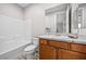 Bathroom with a vanity sink and shower-tub combo at 13 Scenic Terrain Ave, Henderson, NV 89011