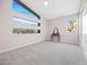 Bright bedroom boasts stylish windows and a large closet for storage at 13 Scenic Terrain Ave, Henderson, NV 89011
